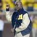 Legendary Michigan basketball player Cazzie Russell waves to the crowd as he is introduced during the first half at Michigan Stadium on Saturday, September 7, 2013. Melanie Maxwell | AnnArbor.com